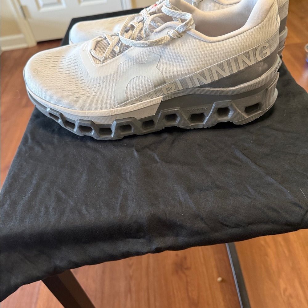 On Running Gray Athletic Shoes with Unique Sole Design